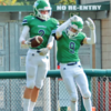 Freshman C-Team player Jacob Werner (No. 2) and Jonah Leaven- good (No. 9) celebrate a touchdown at the Sept. 2 jamboree at Pop Keeney Field.